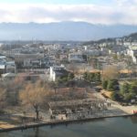 松本市丸の内、国宝・松本城の天守閣から見る市街地の風景